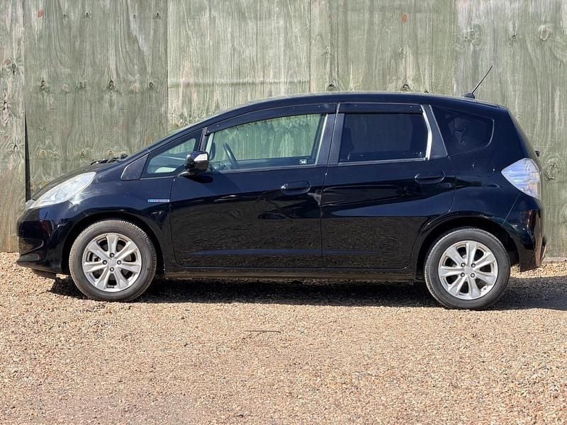 Begagnad Honda Jazz Hybrid 2012 Svart Halvkombi