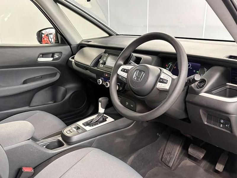 Second-hand Honda Jazz Hybrid 109 CP (80 kW) 2023 Alb Hatchback
