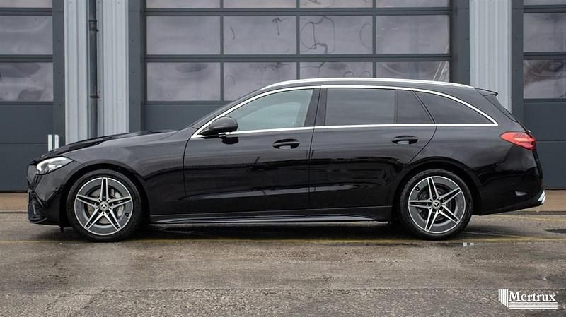 Used Mercedes C300 AMG line 265 HP (194 kW) 2023 Black Estate