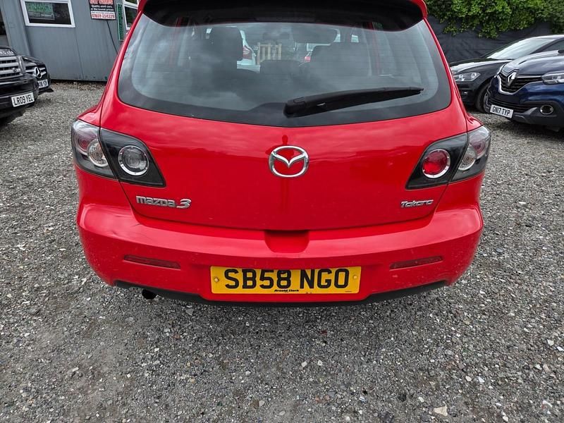 Usado Mazda 3 Takara 105 HP (77 kW) 2009 Vermelho Citadino