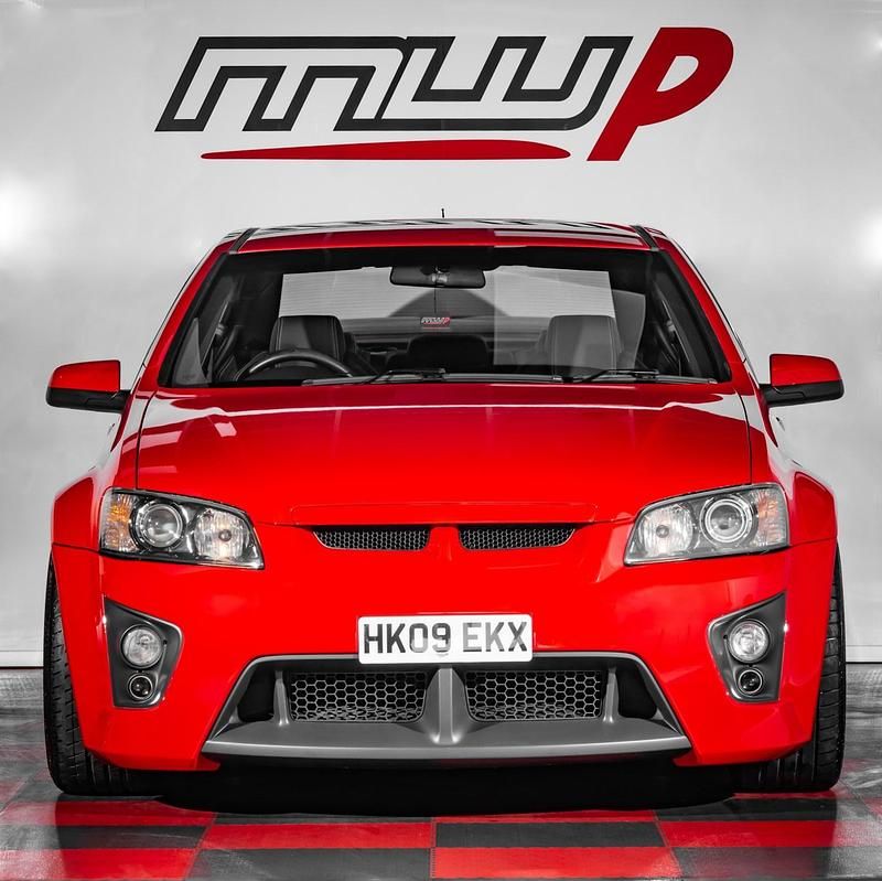 Second-hand Vauxhall VXR8 460 CP (338 kW) 2009 Roșu Berlinǎ