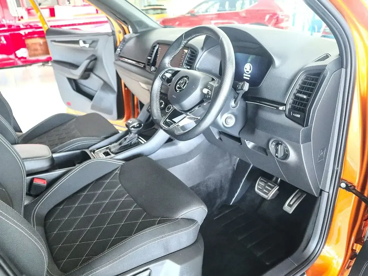 Used Skoda Karoq SportLine 150 HP (110 kW) 2023 Phoenix orange SUV