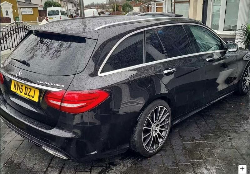 Used Mercedes C300e AMG Line Premium Plus 231 HP (169 kW) 2015 Black Estate