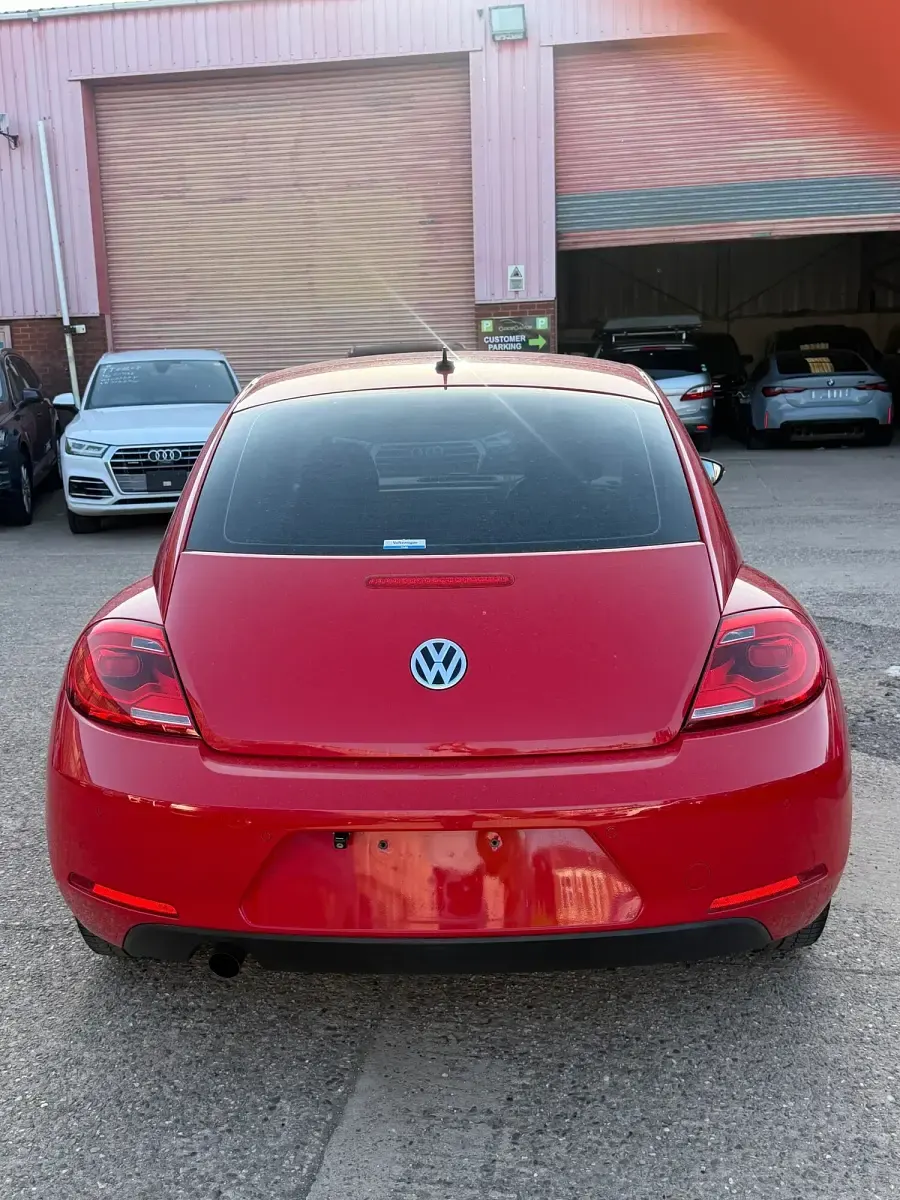 Used VW Beetle 105 HP (77 kW) 2015 Red Hatchback