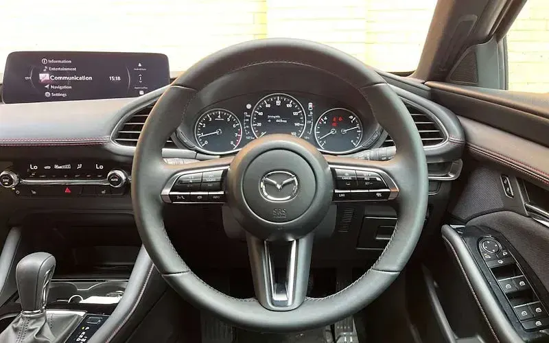 Used Mazda 3 Homura-Line 140 HP (102 kW) 2026 Red Hatchback