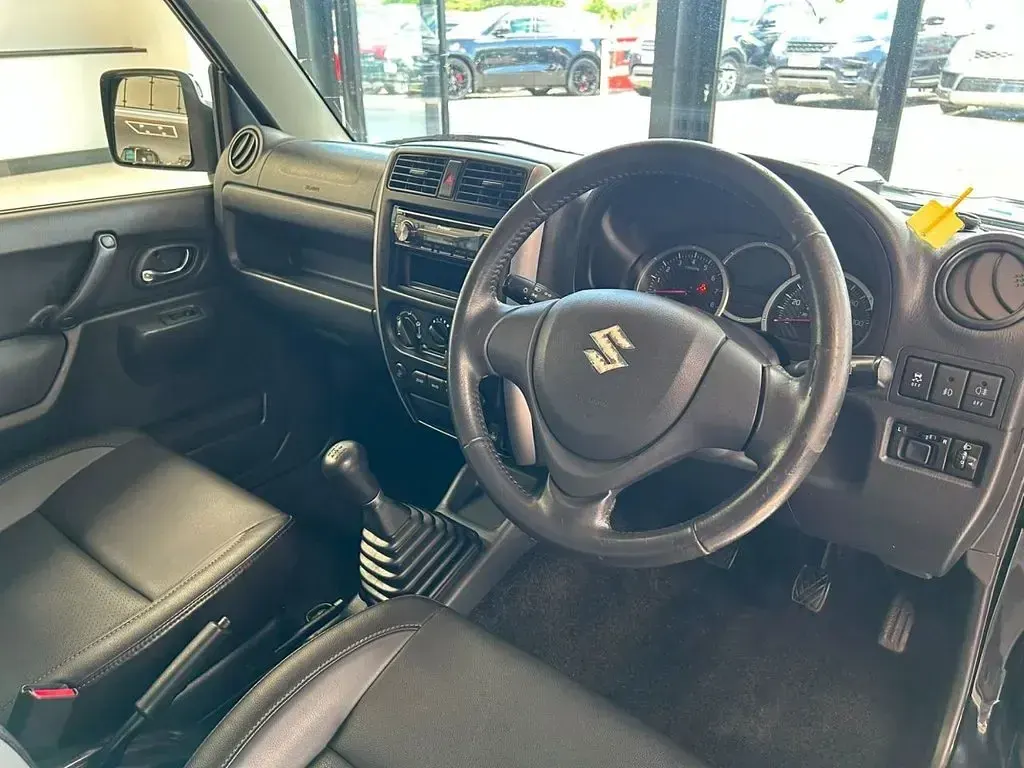 Used Suzuki Jimny SZ4 85 HP (62 kW) 2016 Black/grey SUV