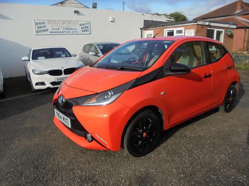 Used Toyota Aygo X-cite 68 HP (50 kW) 2014 Orange Hatchback