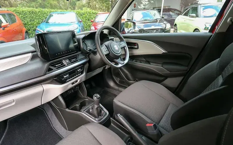 Used Suzuki Swift 82 HP (60 kW) 2026 Burning red pearl / super black pearl Hatchback