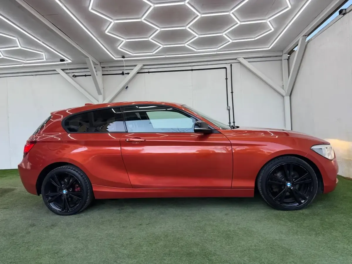 Usado BMW 118 Sport Line 170 HP (125 kW) 2013 Laranja Citadino