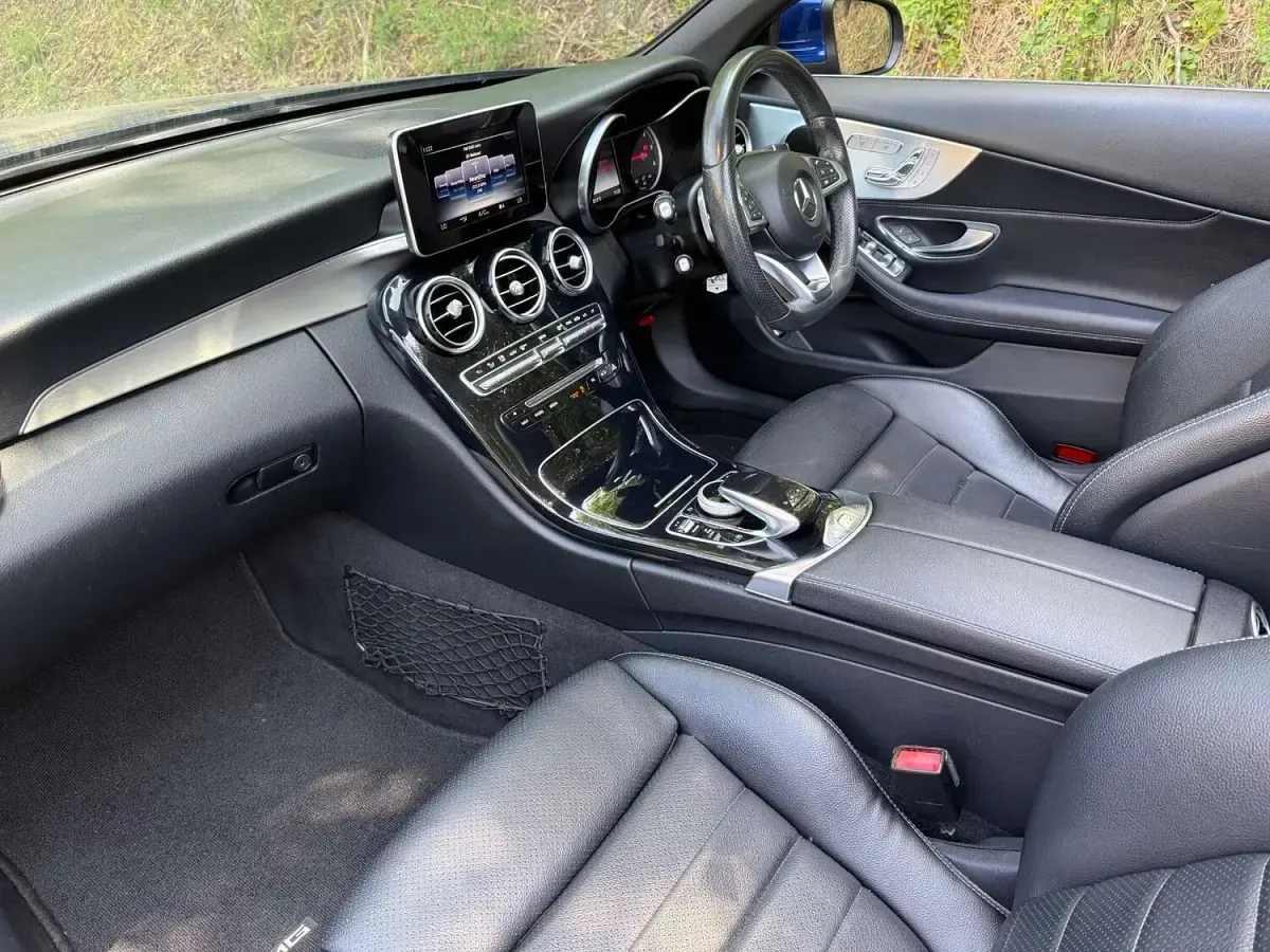 Used Mercedes C220 AMG line 170 HP (125 kW) 2017 Blue Cabriolet