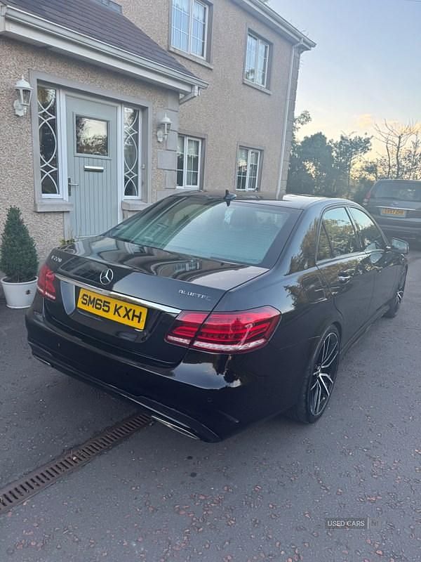 Used Mercedes E220 AMG 175 HP (128 kW) 2015 Black Sedan