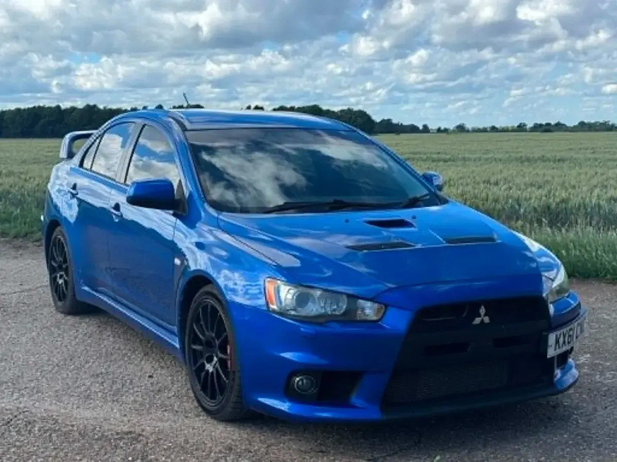 Used Mitsubishi Lancer 240 HP (176 kW) 2011 Blue Sedan