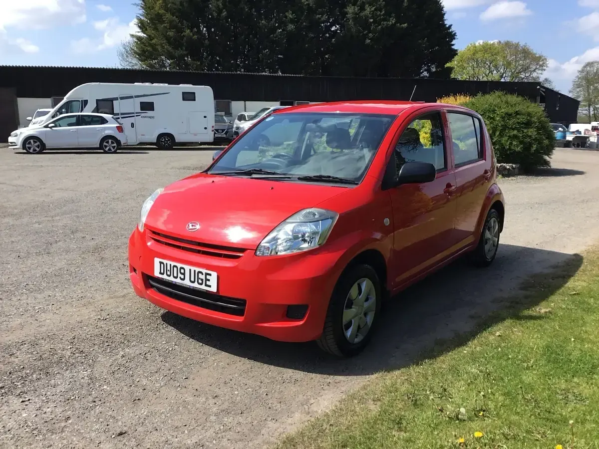 Used Daihatsu Sirion 69 HP (50 kW) 2009 Red Hatchback