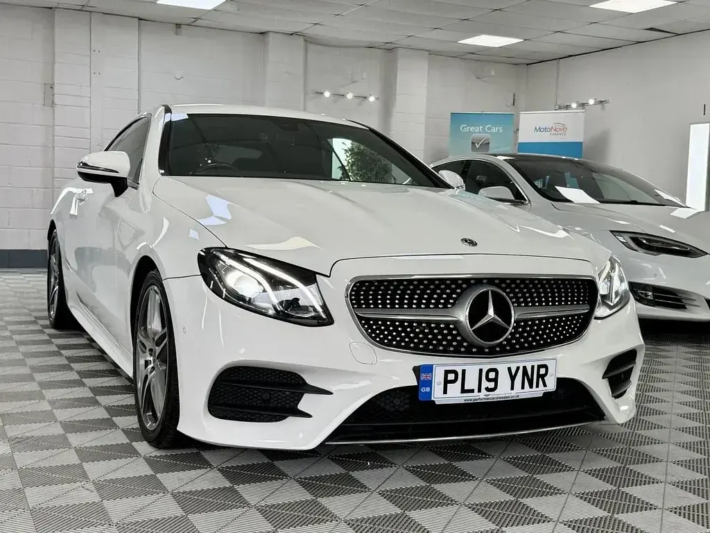 Used Mercedes E220 AMG line 194 HP (142 kW) 2019 White Coupe