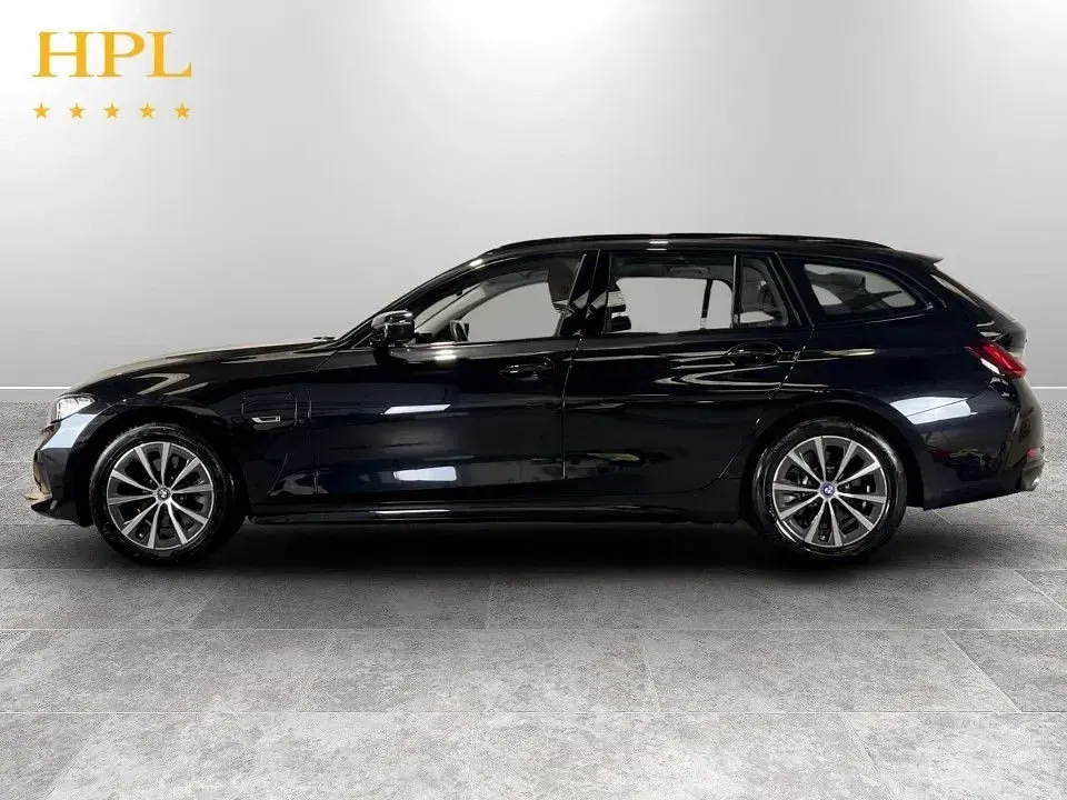 Used BMW 330e Sport Line 292 HP (214 kW) 2023 Black Estate