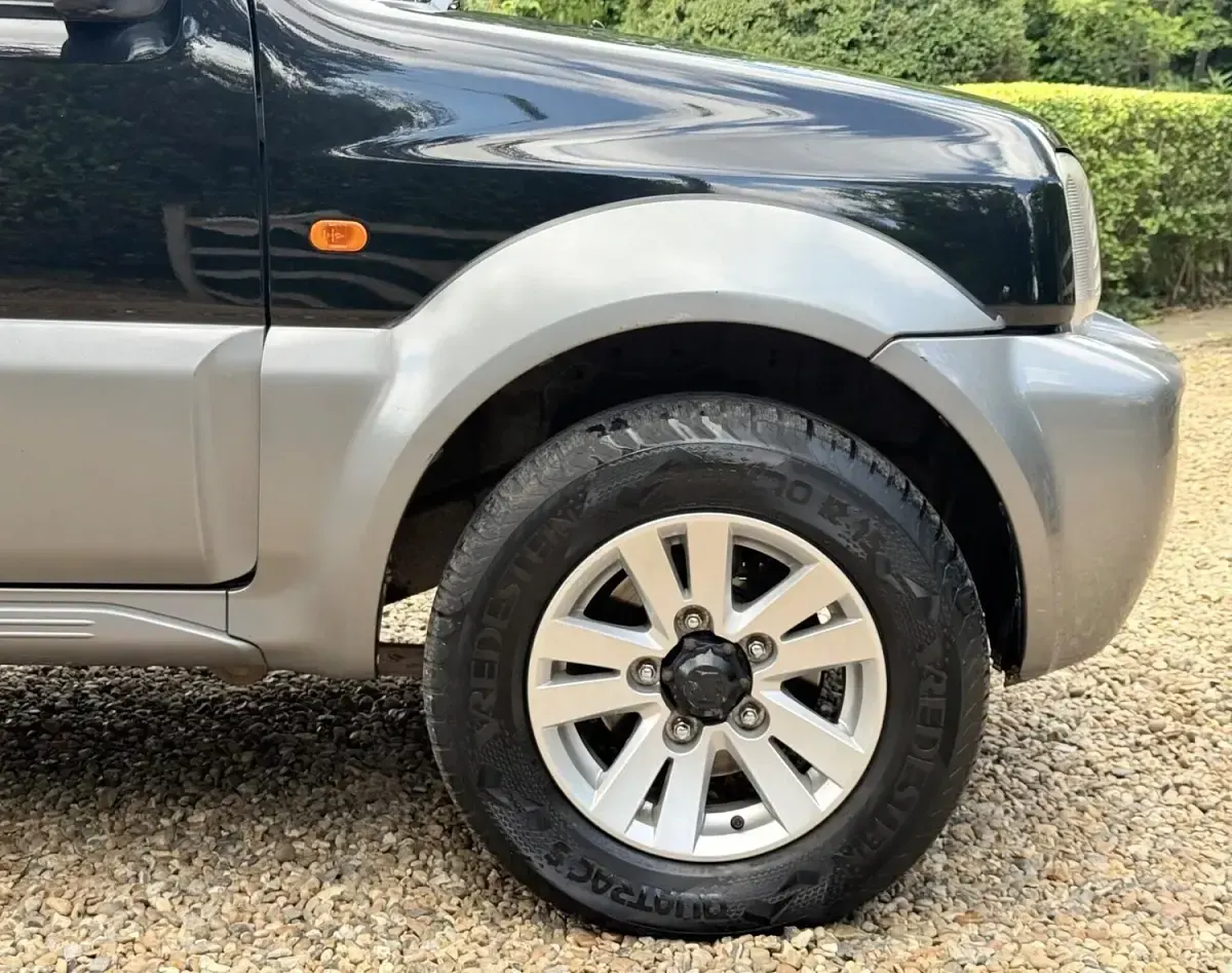 Used Suzuki Jimny SZ4 85 HP (62 kW) 2011 Black SUV
