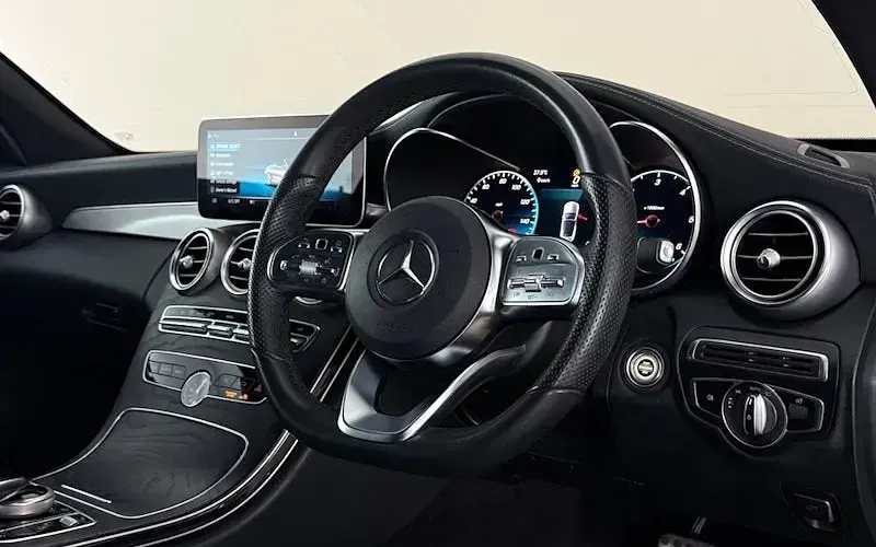 Used Mercedes C220 AMG line 194 HP (142 kW) 2019 Black Cabriolet