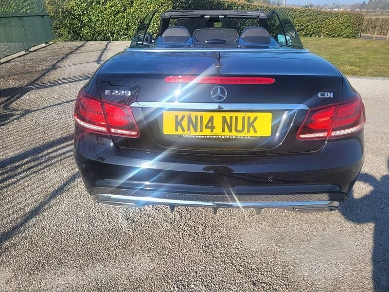 Used Mercedes E220 AMG 170 HP (125 kW) 2014 Black Cabriolet