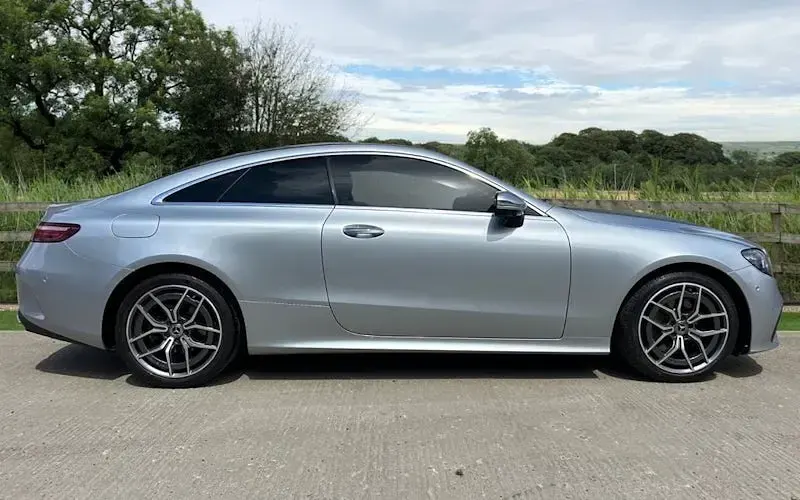 Used Mercedes E220 AMG line 194 HP (142 kW) 2021 Silver Coupe