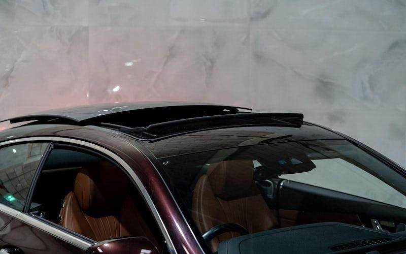 Used Mercedes E220 AMG Line Premium Plus 194 HP (142 kW) 2018 Red Coupe