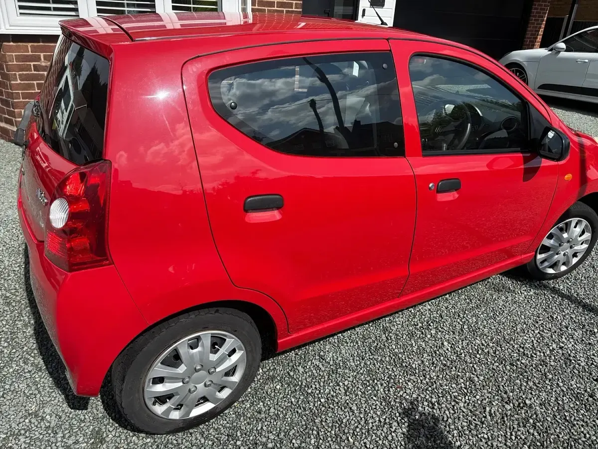 Used Suzuki Alto 68 HP (50 kW) 2014 Red Hatchback
