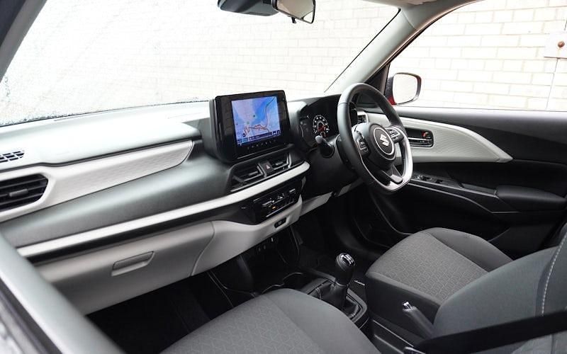 Used Suzuki Swift 82 HP (60 kW) 2024 Premium  burning red pearl Hatchback