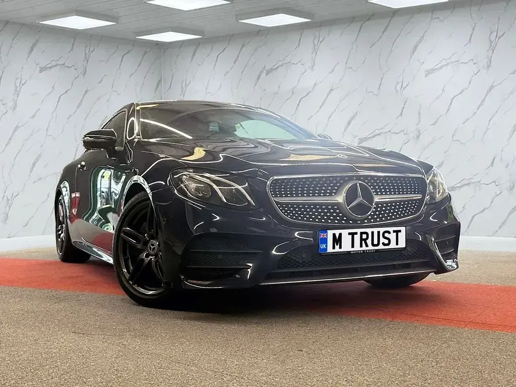 Used Mercedes E220 AMG line 194 HP (142 kW) 2019 Blue Coupe
