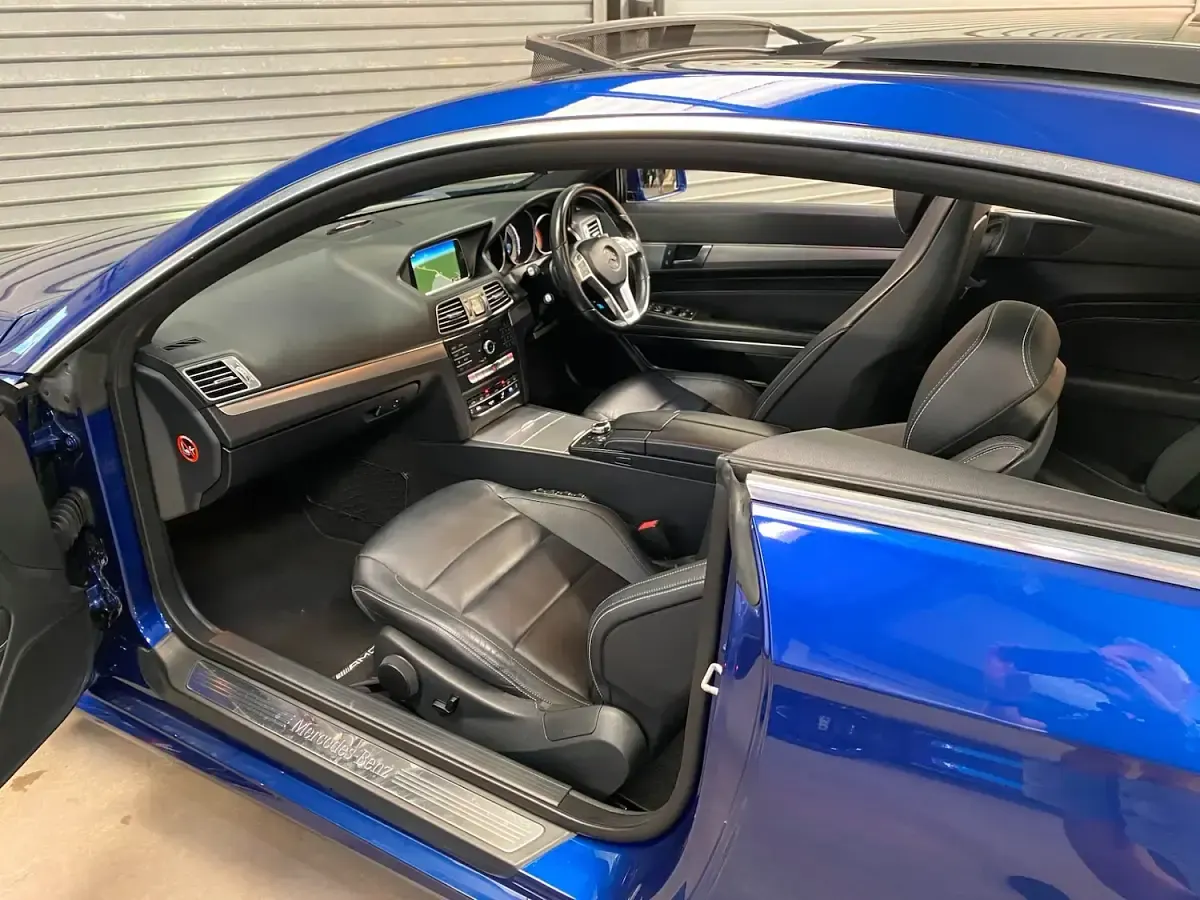 Used Mercedes E220 AMG line 175 HP (128 kW) 2016 Blue Coupe