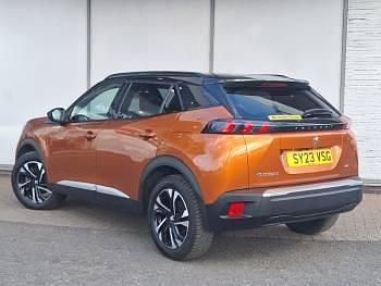 Second-hand Peugeot e-2008 GTi 100 kW (136 CP) 2023 Portocaliu SUV