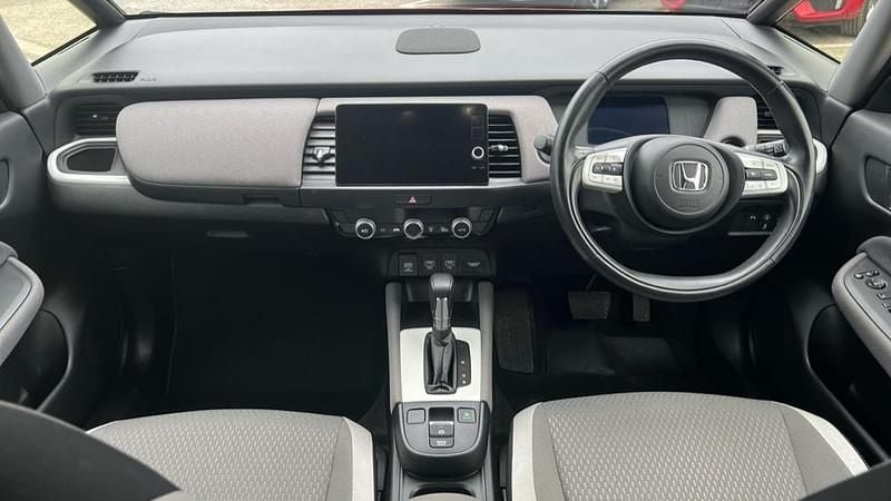 Used Honda Jazz Hybrid 109 HP (80 kW) 2023 Premium  crystal red Hatchback