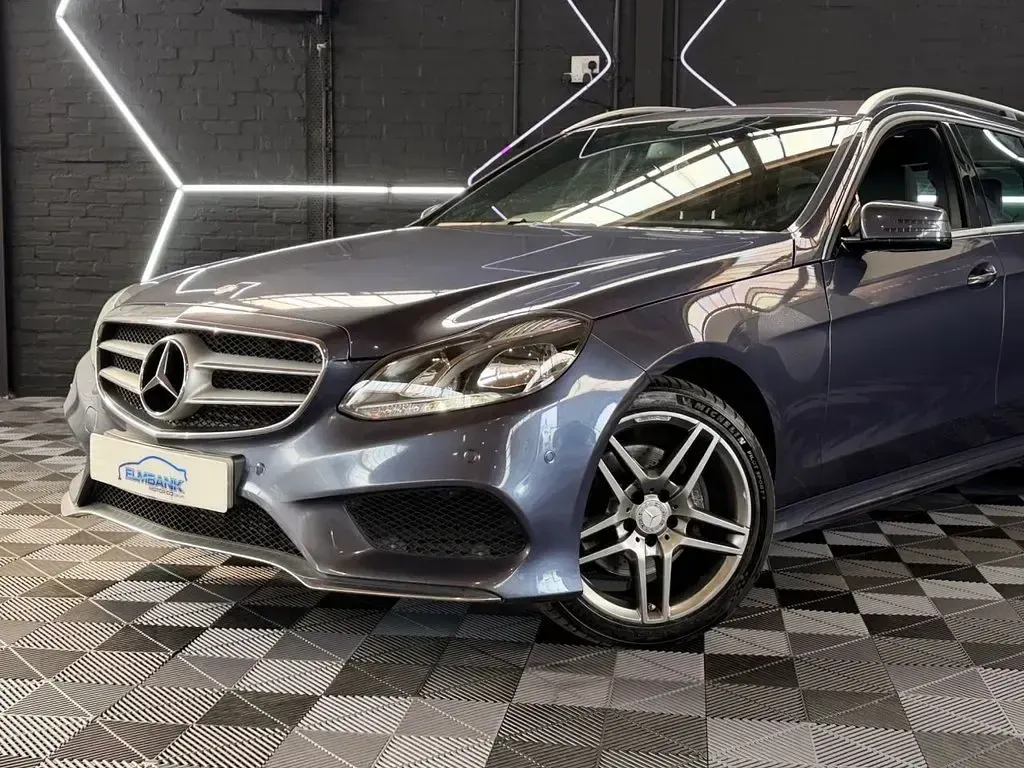 Used Mercedes E220 AMG line 177 HP (130 kW) 2015 Blue Estate