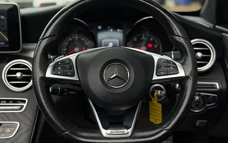 Used Mercedes C220 AMG line 170 HP (125 kW) 2017 Black Cabriolet