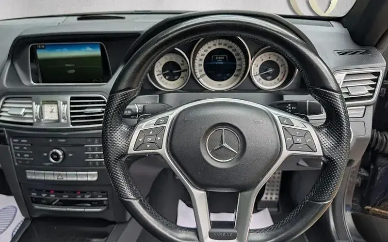 Used Mercedes E200 AMG line 184 HP (135 kW) 2016 Blue Cabriolet