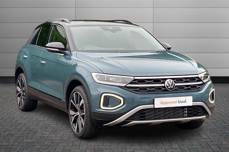 Ravenna blue with black roof New 2025 VW T-Roc Design SUV | £31,995 (Expensive) - Image 1/4