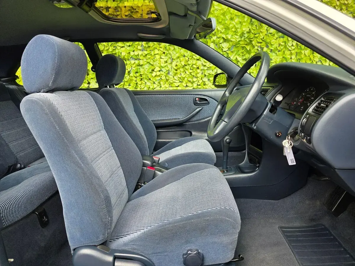 Used Toyota Corolla 87 HP (63 kW) 1993 White Hatchback