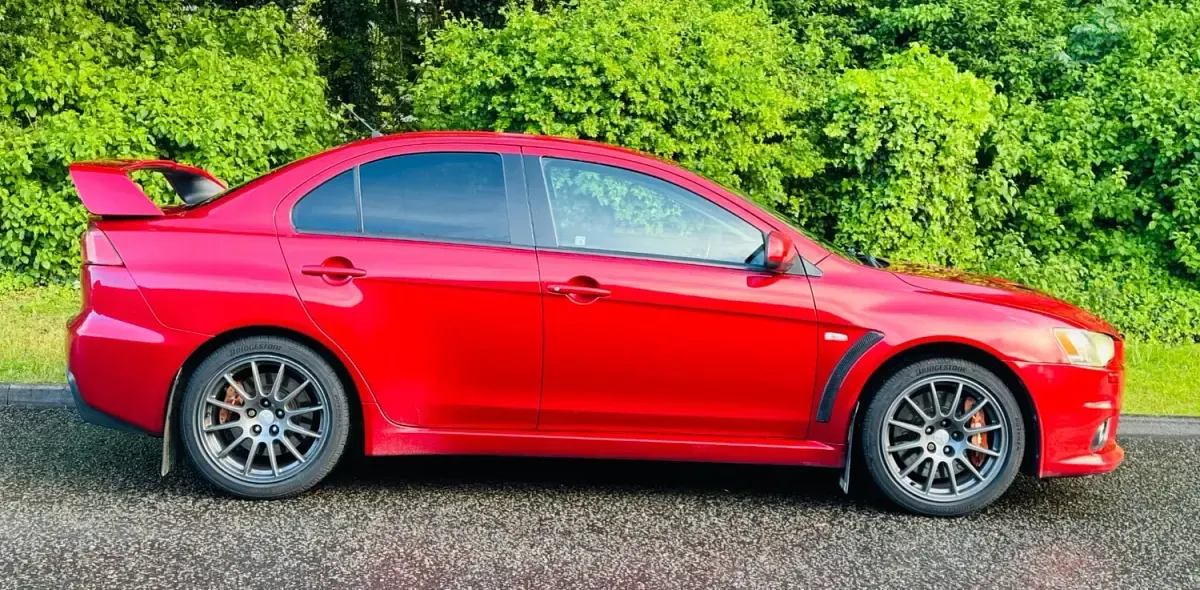 Usado Mitsubishi Lancer 150 HP (110 kW) 2011 Vermelho Sedan