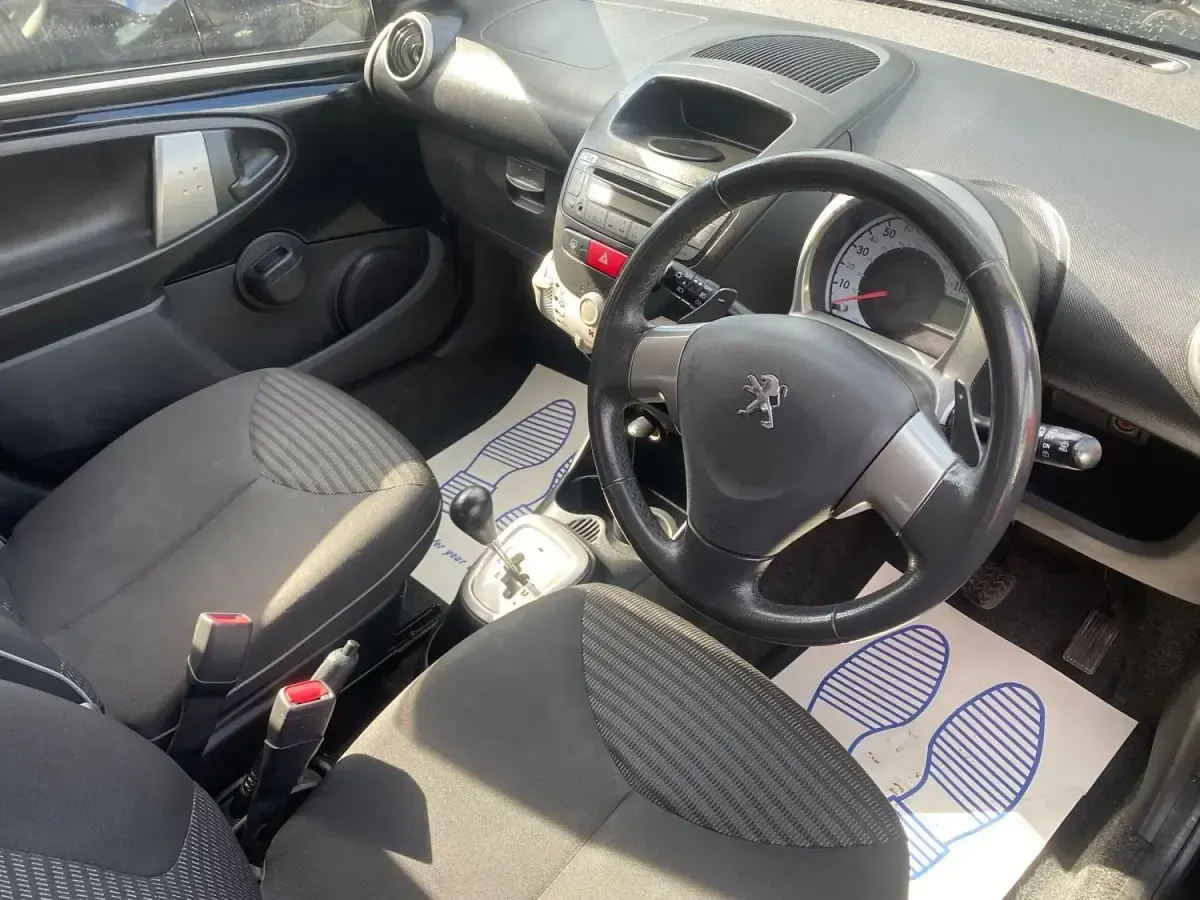 Używany Peugeot 107 Active 68 KM (50 kW) 2013 Czarny Hatchback