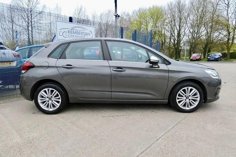 Usado Citroën C4 Flair 100 HP (73 kW) 2015 Cinzento Citadino