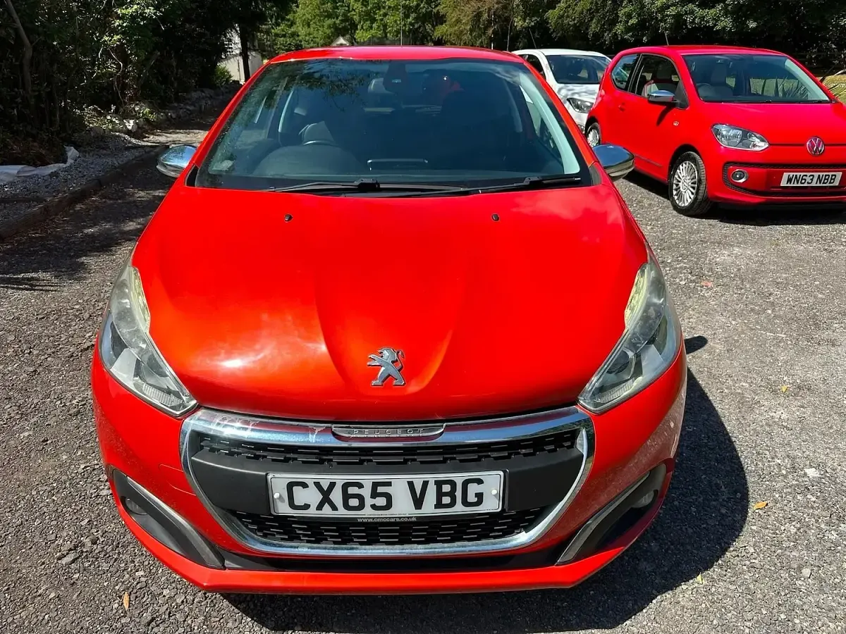 Used Peugeot 208 Allure 82 HP (60 kW) 2015 Orange Hatchback