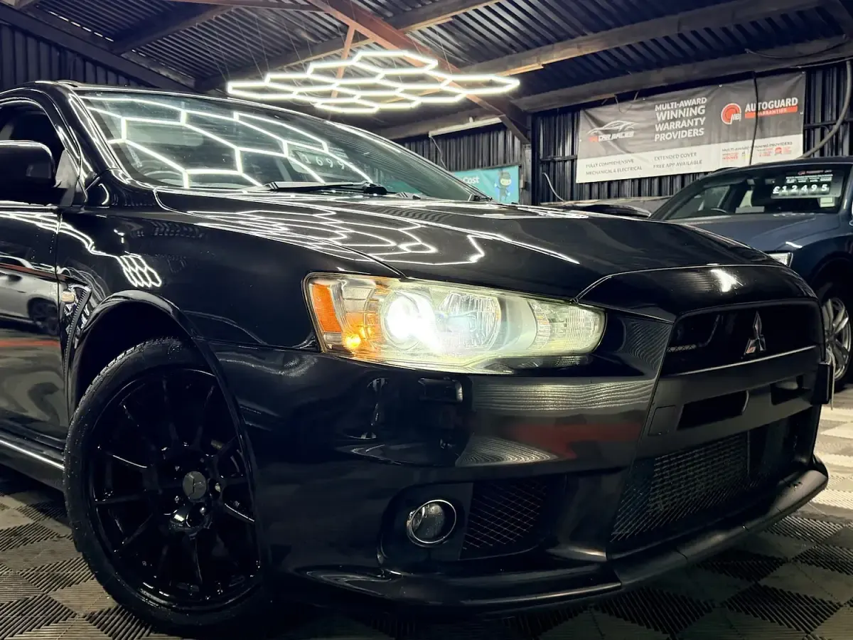 Used Mitsubishi Lancer 240 HP (176 kW) 2011 Black Sedan