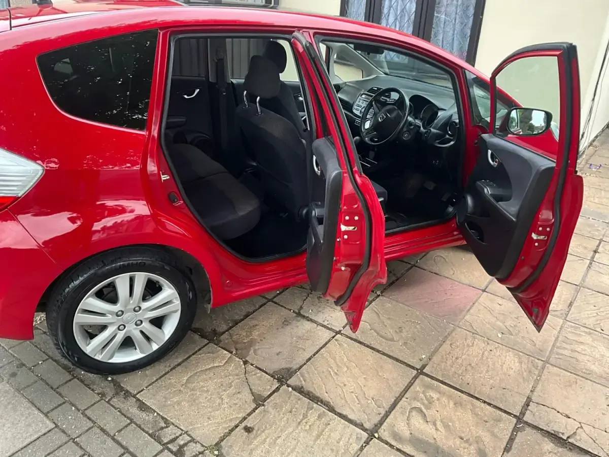 Second-hand Honda Jazz EX 99 CP (72 kW) 2012 Roșu Hatchback