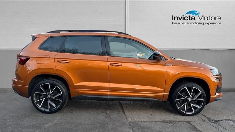Used Skoda Karoq SportLine 150 HP (110 kW) 2023 Pheonix orange metallic SUV