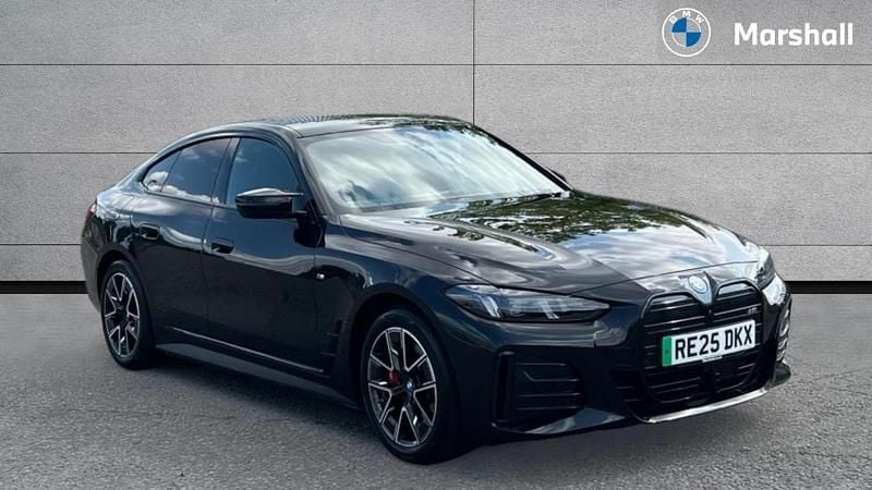 Black sapphire Used 2025 BMW i4 Shadowline Sedan | £47,391 (Good price) - Image 1/4