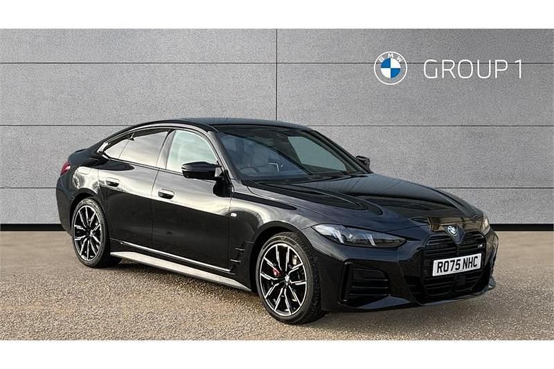 Black sapphire metallic paint New 2025 BMW M440 M Sport Sedan | £56,795 - Image 1/4