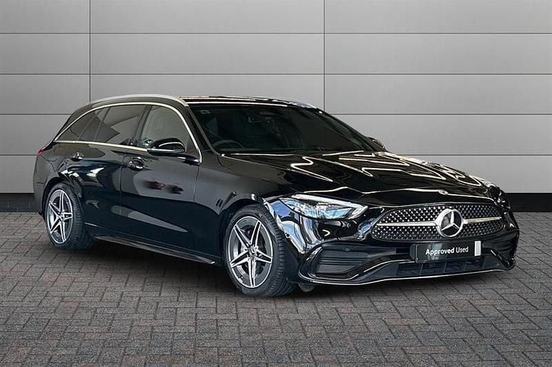 Obsidian black Used 2024 Mercedes C220 AMG line Estate | £32,550 (Fair price) - Image 1/4