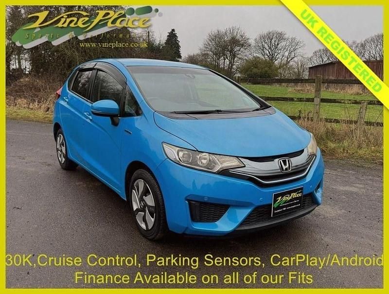 Used Honda Fit Hybrid 135 HP (99 kW) 2014 Blue Hatchback