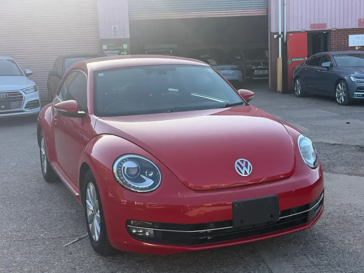 Used VW Beetle 105 HP (77 kW) 2015 Red Hatchback