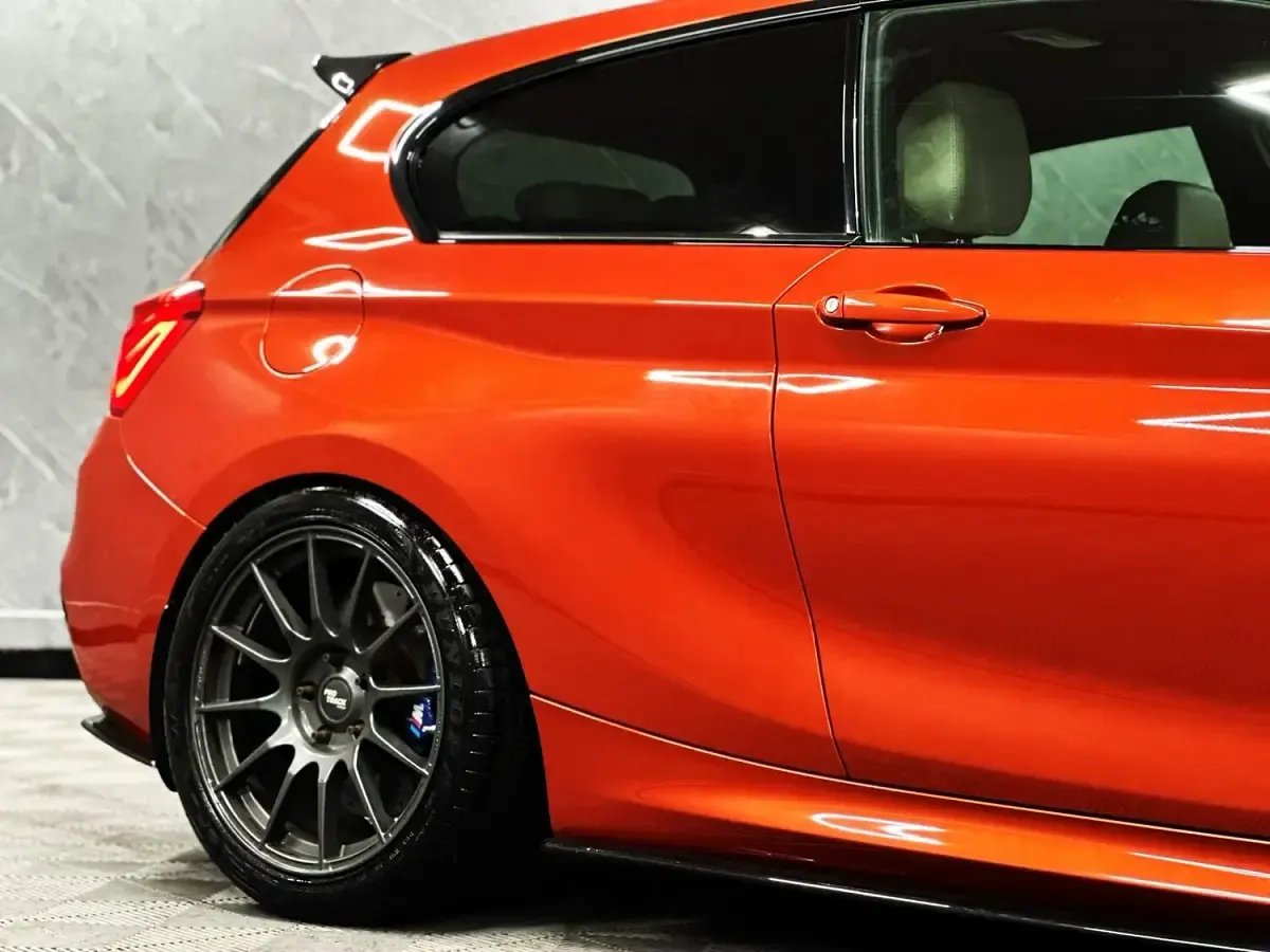 Used BMW M140 M Sport 471 HP (346 kW) 2016 Orange Hatchback