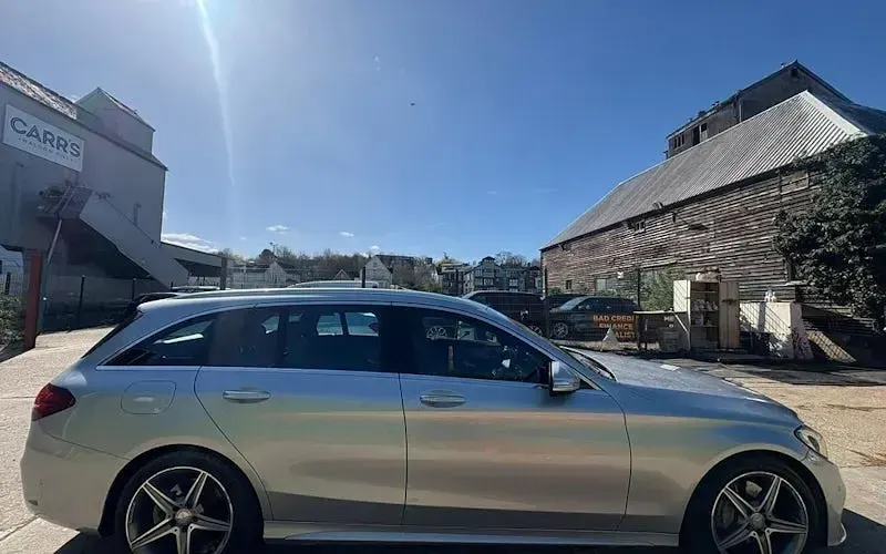 Second-hand Mercedes C220 AMG Line Premium Plus 170 CP (125 kW) 2015 Argintiu Break
