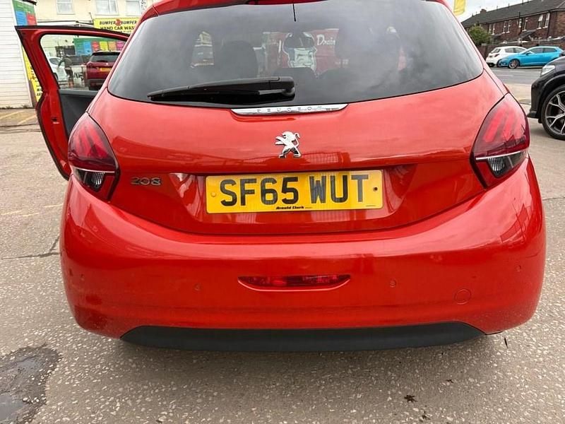 Used Peugeot 208 Allure 82 HP (60 kW) 2015 Orange Hatchback